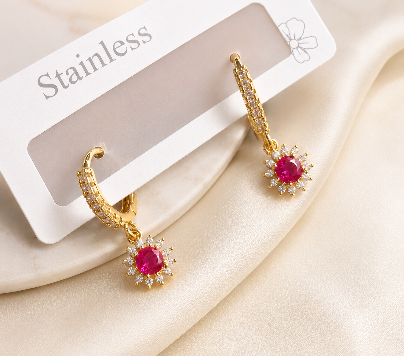 Ruby aura charm earring